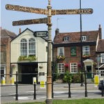 Pre-restoration signpost